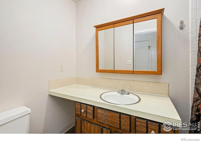 1620-1626 E 17th St, Loveland, CO 80538 - bathroom with vanity and toilet