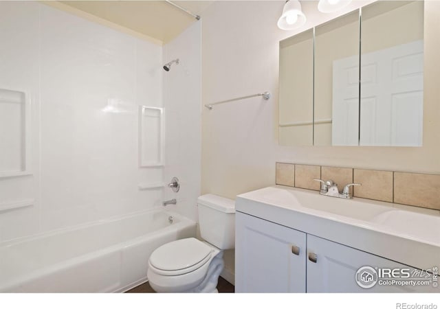 1620-1626 E 17th St, Loveland, CO 80538 - bathroom with vanity, shower / tub combination, and backsplash