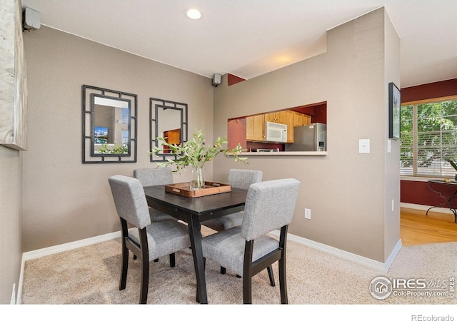 6721 Antigua Dr Unit 57, Fort Collins, CO 80525 - dining space featuring baseboards and recessed lighting