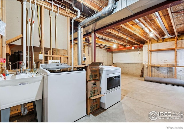 6721 Antigua Dr Unit 57, Fort Collins, CO 80525 - washroom with washer and clothes dryer