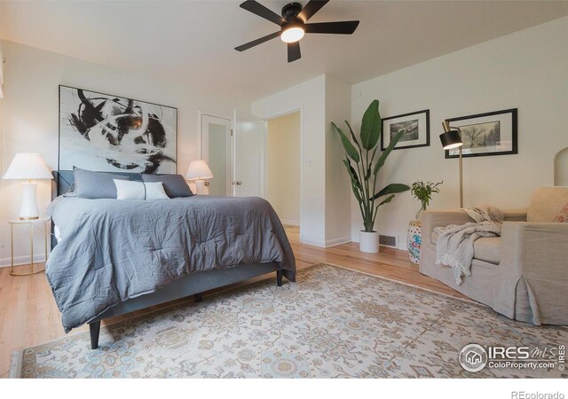 1539 Peterson St, Fort Collins, CO 80524 - bedroom featuring wood finished floors and a ceiling fan