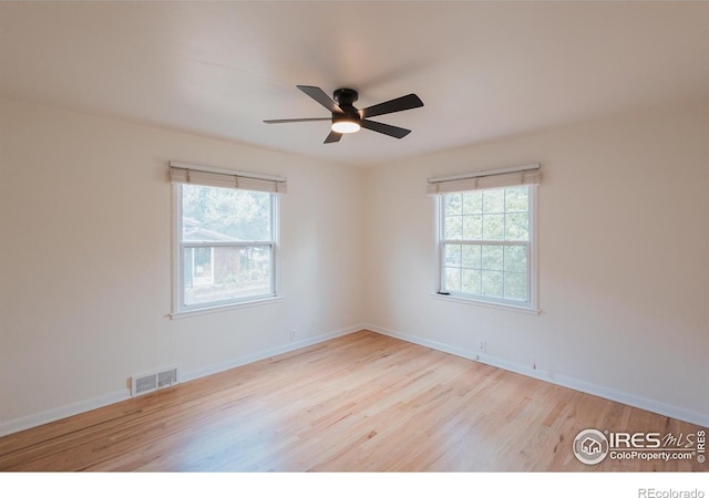 1539 Peterson St, Fort Collins, CO 80524 - empty room featuring wood finished floors and ceiling fan