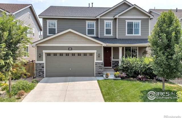 6244 Waterman Way, Frederick, CO 80516 - craftsman house with driveway, stone siding, and covered porch