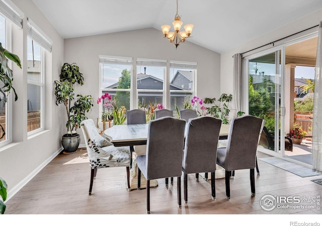 6244 Waterman Way, Frederick, CO 80516 - dining space with a chandelier, light wood-style floors, and lofted ceiling