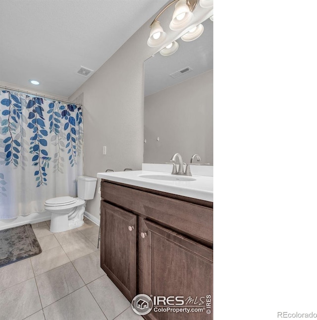 6244 Waterman Way, Frederick, CO 80516 - full bath featuring vanity, tile patterned floors, and a shower with curtain