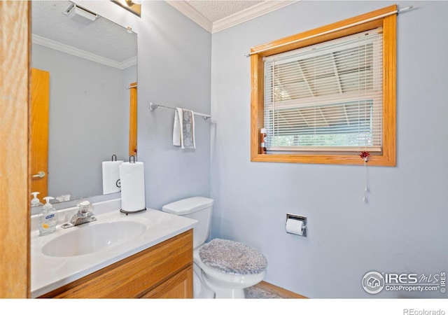 611 Elizabeth Ave, Platteville, CO 80651 - half bathroom featuring vanity, a textured ceiling, and crown molding