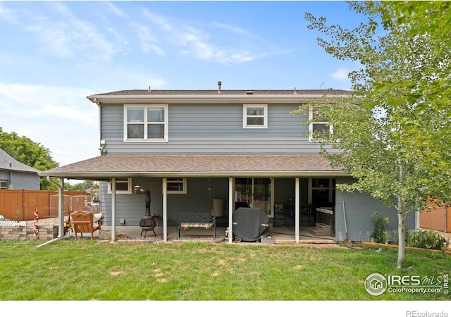 611 Elizabeth Ave, Platteville, CO 80651 - rear view of house featuring a patio area