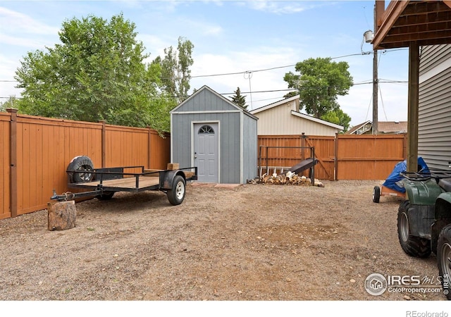 611 Elizabeth Ave, Platteville, CO 80651 - fenced backyard with a storage unit