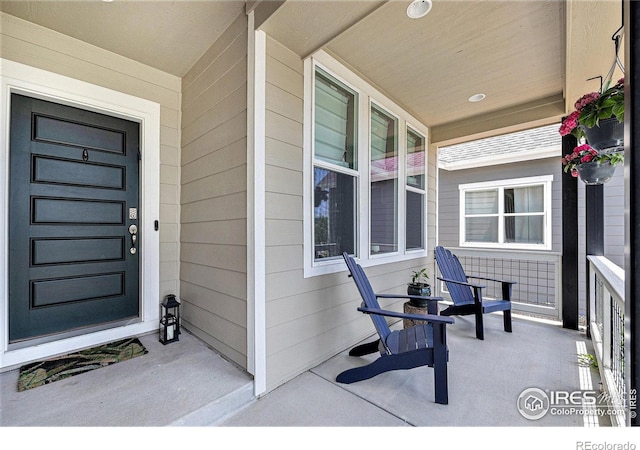 19239 W 88th Dr, Arvada, CO 80007 - entrance to property with a porch