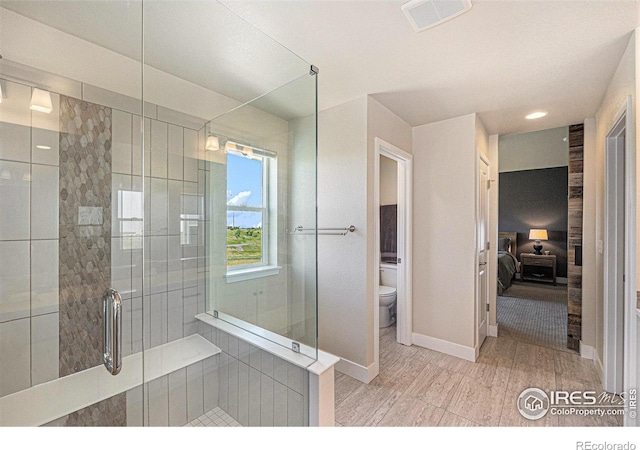 19239 W 88th Dr, Arvada, CO 80007 - bathroom with ensuite bathroom and a shower stall