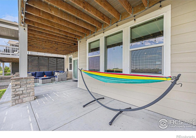 19239 W 88th Dr, Arvada, CO 80007 - view of patio / terrace with an outdoor living space