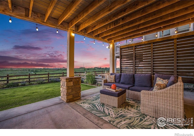 19239 W 88th Dr, Arvada, CO 80007 - view of patio / terrace with an outdoor living space and a view of countryside