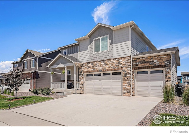 7415 E 158th Pl, Thornton, CO 80602 - craftsman-style house featuring stone siding, concrete driveway, and a porch