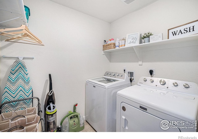 7415 E 158th Pl, Thornton, CO 80602 - washroom with washing machine and clothes dryer and tile patterned flooring