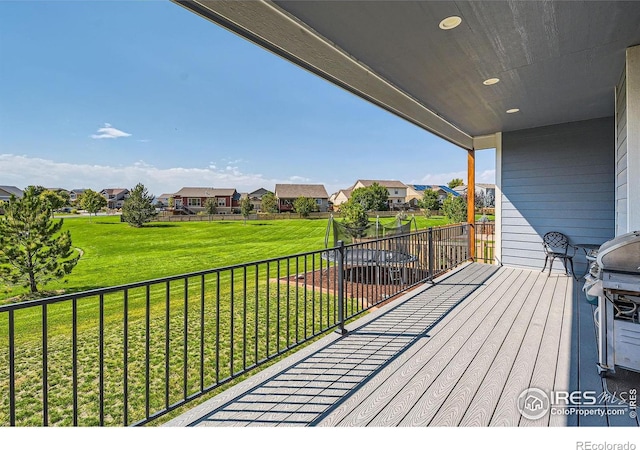 5279 Long Dr, Timnath, CO 80547 - deck with a residential view, a lawn, and a grill
