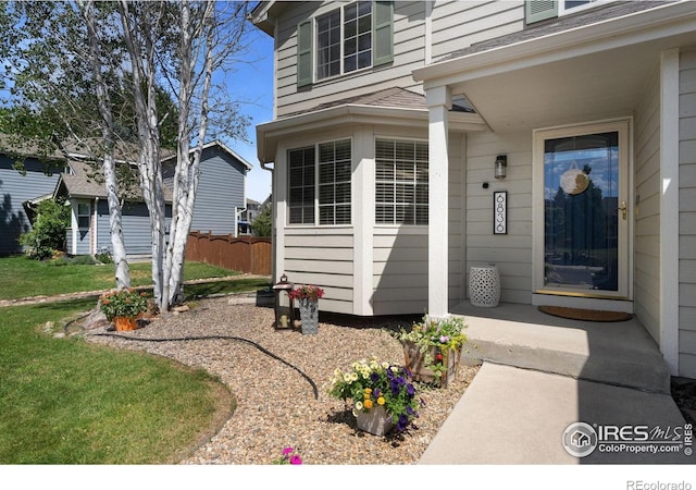 6836 Timpas Dr, Fort Collins, CO 80525 - doorway to property featuring a shingled roof