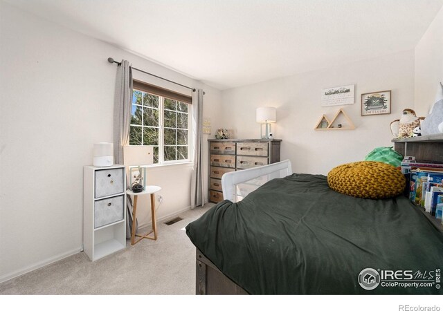 6836 Timpas Dr, Fort Collins, CO 80525 - carpeted bedroom featuring baseboards