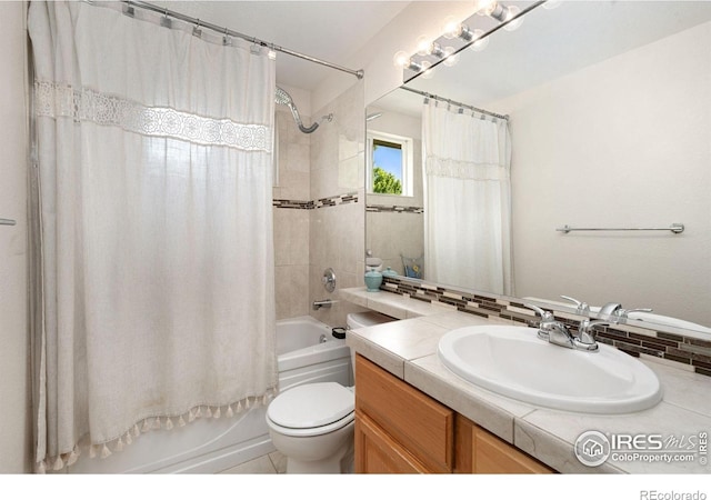 6836 Timpas Dr, Fort Collins, CO 80525 - full bathroom featuring vanity, shower / bath combo with shower curtain, and backsplash
