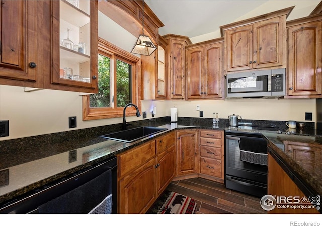 200 Falls Creek Dr, Bellvue, CO 80512 - kitchen with stainless steel microwave, black dishwasher, electric range oven, dark wood finished floors, and dark stone countertops