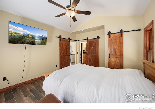 200 Falls Creek Dr, Bellvue, CO 80512 - bedroom featuring a barn door, dark wood-style floors, vaulted ceiling, and ceiling fan