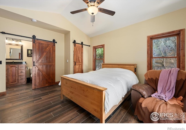 200 Falls Creek Dr, Bellvue, CO 80512 - bedroom with a barn door, lofted ceiling, dark wood finished floors, ceiling fan, and connected bathroom