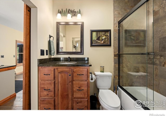 200 Falls Creek Dr, Bellvue, CO 80512 - full bath featuring vanity, enclosed tub / shower combo, and wood finished floors