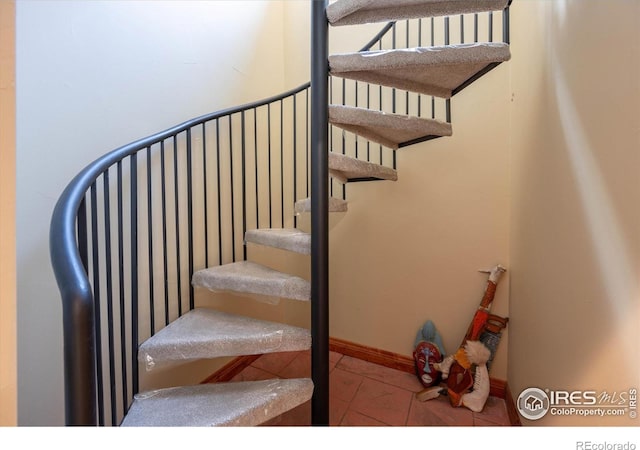 200 Falls Creek Dr, Bellvue, CO 80512 - staircase with tile patterned floors