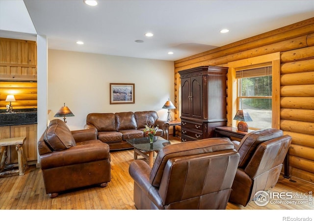 280 Hummer Dr, Nederland, CO 80466 - living room featuring light wood finished floors, recessed lighting, and log walls