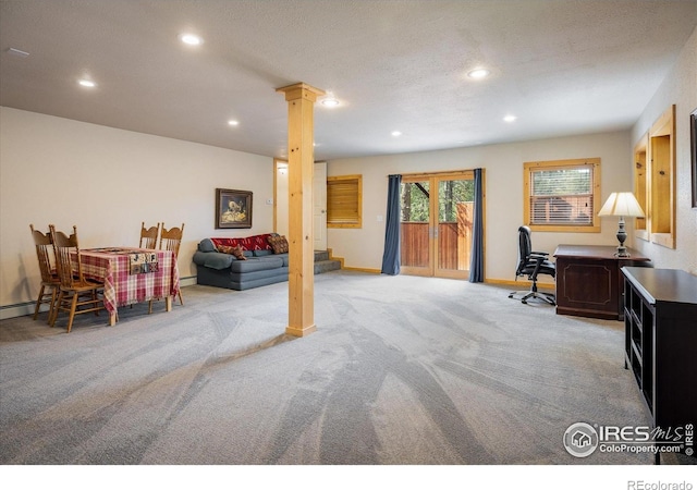 280 Hummer Dr, Nederland, CO 80466 - office area with light colored carpet, decorative columns, recessed lighting, and a baseboard radiator