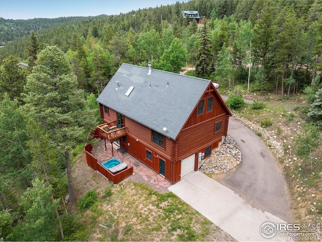 280 Hummer Dr, Nederland, CO 80466 - aerial view of property and surrounding area with a heavily wooded area