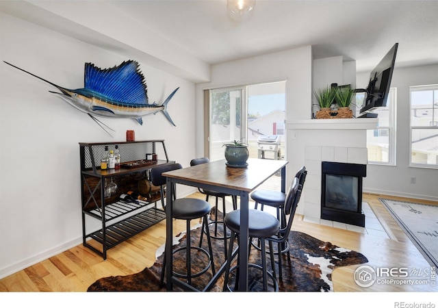 3970 Colorado Ave Unit G, Boulder, CO 80303 - dining space with wood finished floors and a fireplace