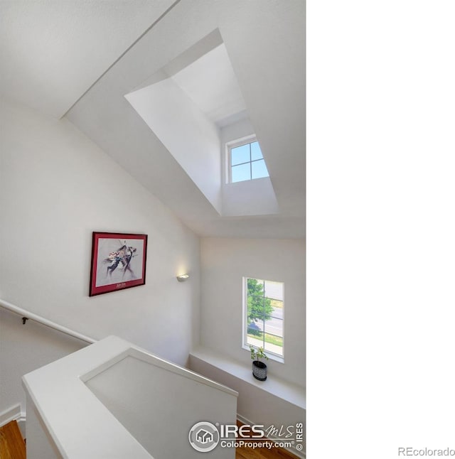 3970 Colorado Ave Unit G, Boulder, CO 80303 - stairway featuring lofted ceiling and wood finished floors
