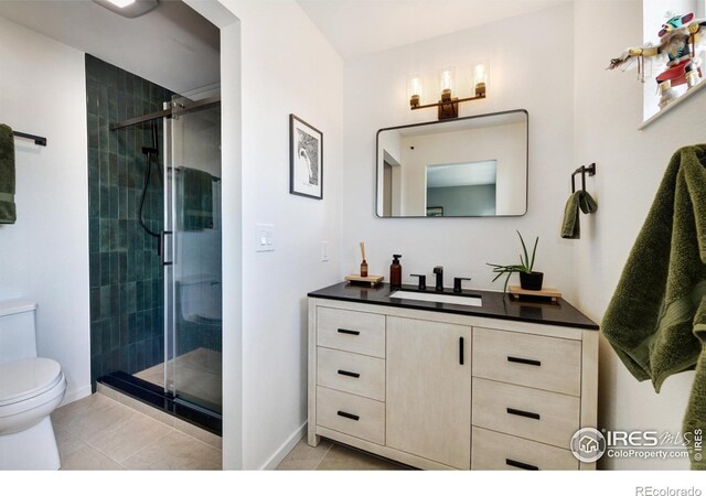 3970 Colorado Ave Unit G, Boulder, CO 80303 - bathroom featuring vanity, tile patterned flooring, and a shower stall