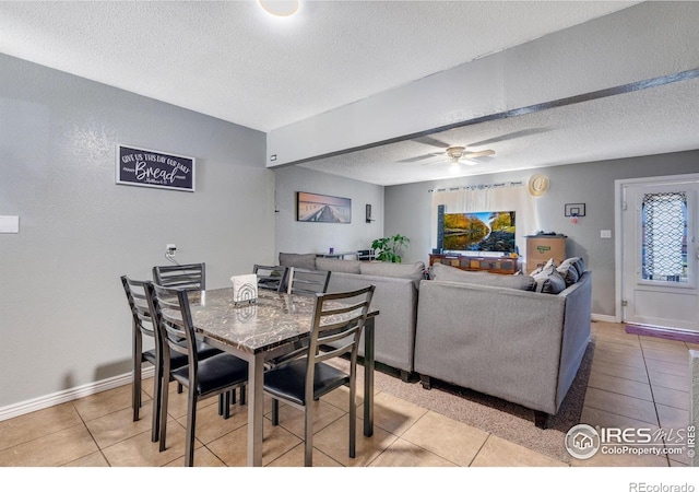 5519 Tucson St, Denver, CO 80239 - dining space with light tile patterned floors, a textured ceiling, and ceiling fan