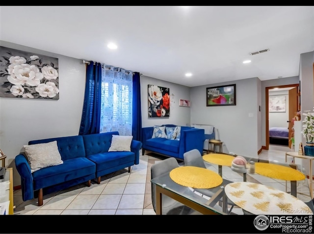 5519 Tucson St, Denver, CO 80239 - living room with light tile patterned floors and recessed lighting