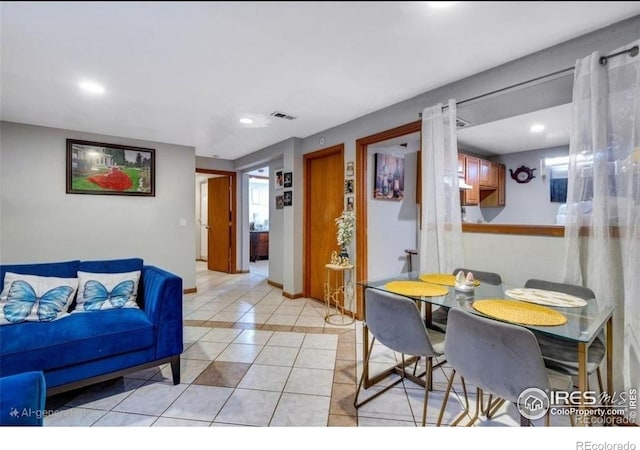5519 Tucson St, Denver, CO 80239 - dining space featuring light tile patterned floors and recessed lighting