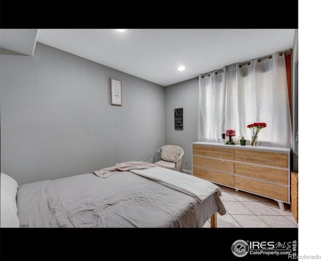 5519 Tucson St, Denver, CO 80239 - bedroom with light tile patterned flooring and recessed lighting
