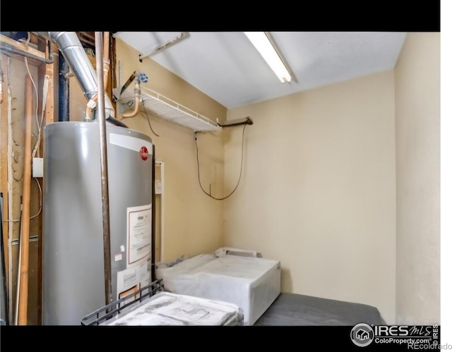 5519 Tucson St, Denver, CO 80239 - laundry area featuring gas water heater