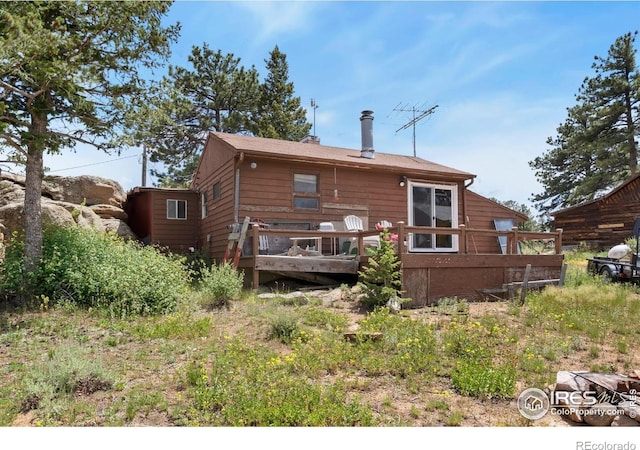 983 Ramona Dr, Red Feather Lakes, CO 80545 - back of property featuring a deck