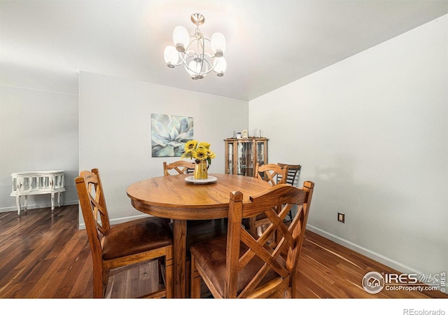 39 Ward Dr Unit 202, Greeley, CO 80634 - dining room with a chandelier and wood finished floors