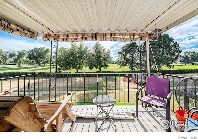 39 Ward Dr Unit 202, Greeley, CO 80634 - wooden terrace featuring view of golf course