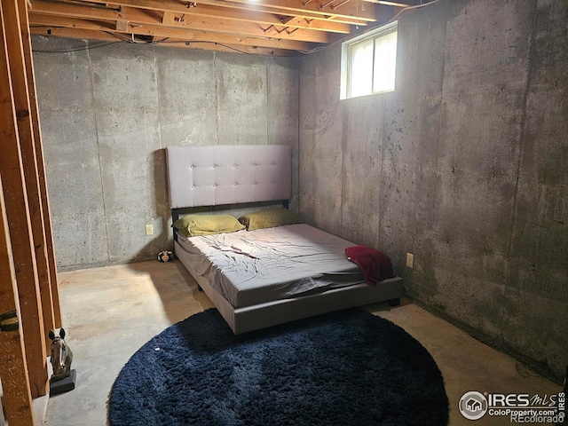 1402 Fillmore St, Sterling, CO 80751 - bedroom featuring unfinished concrete floors