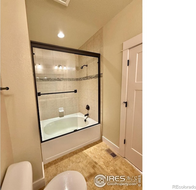 2110 Nancy Gray Ave, Fort Collins, CO 80525 - bathroom with combined bath / shower with glass door and toilet