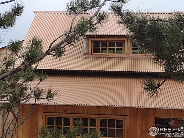 1001 County Road 86, Red Feather Lakes, CO 80545 - view of property exterior with a metal roof