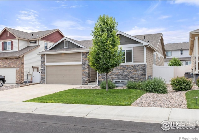 619 Rosedale St, Severance, CO 80550 - craftsman-style home featuring stone siding, driveway, and a garage