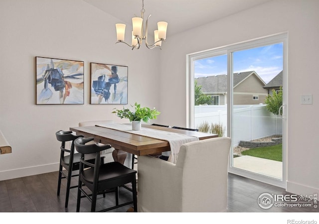 619 Rosedale St, Severance, CO 80550 - dining space featuring a chandelier and dark wood-style flooring