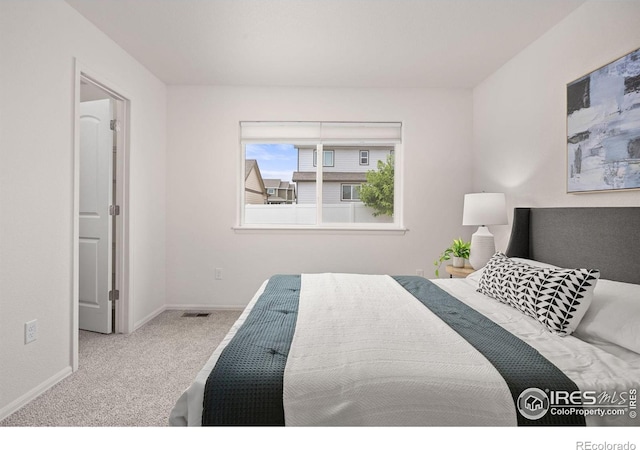 619 Rosedale St, Severance, CO 80550 - carpeted bedroom featuring baseboards