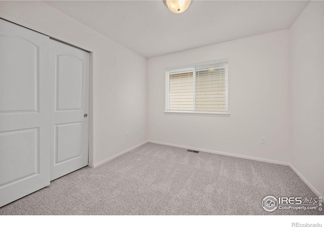 619 Rosedale St, Severance, CO 80550 - unfurnished bedroom featuring carpet flooring and a closet