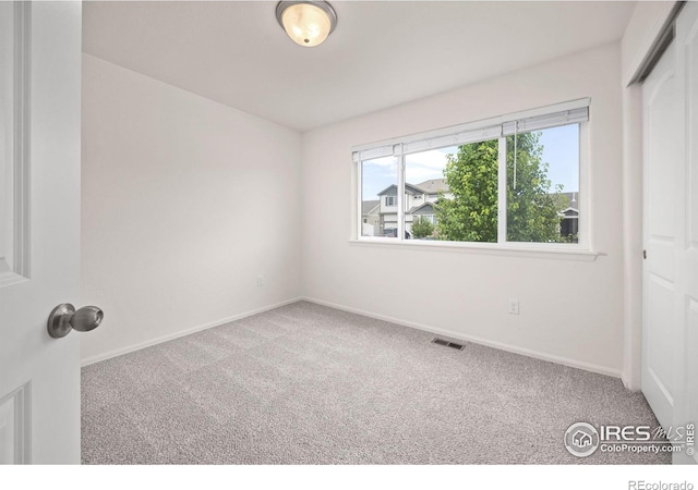 619 Rosedale St, Severance, CO 80550 - unfurnished bedroom featuring carpet and a closet