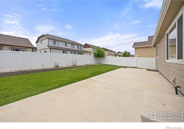 619 Rosedale St, Severance, CO 80550 - fenced backyard featuring a patio and a residential view